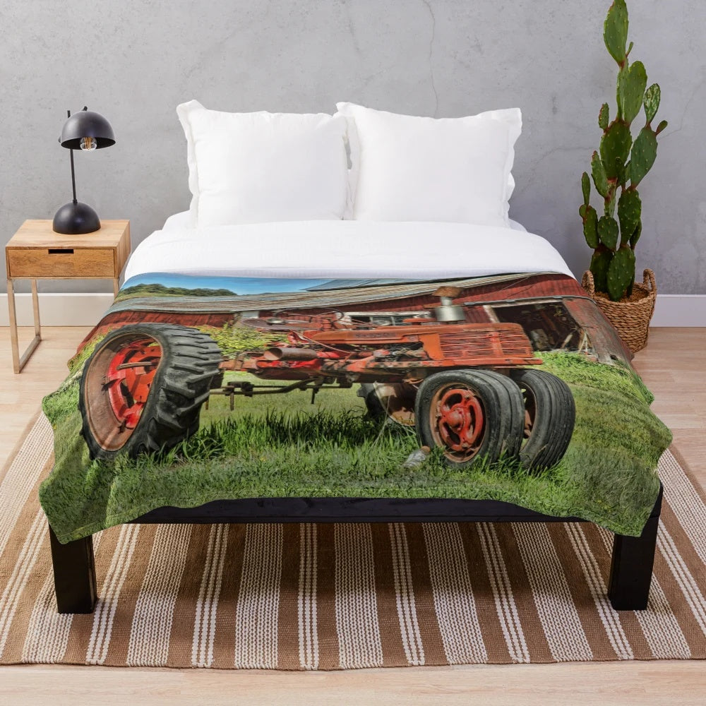 Cozy plush blanket featuring a vintage 1952 Farmall tractor design