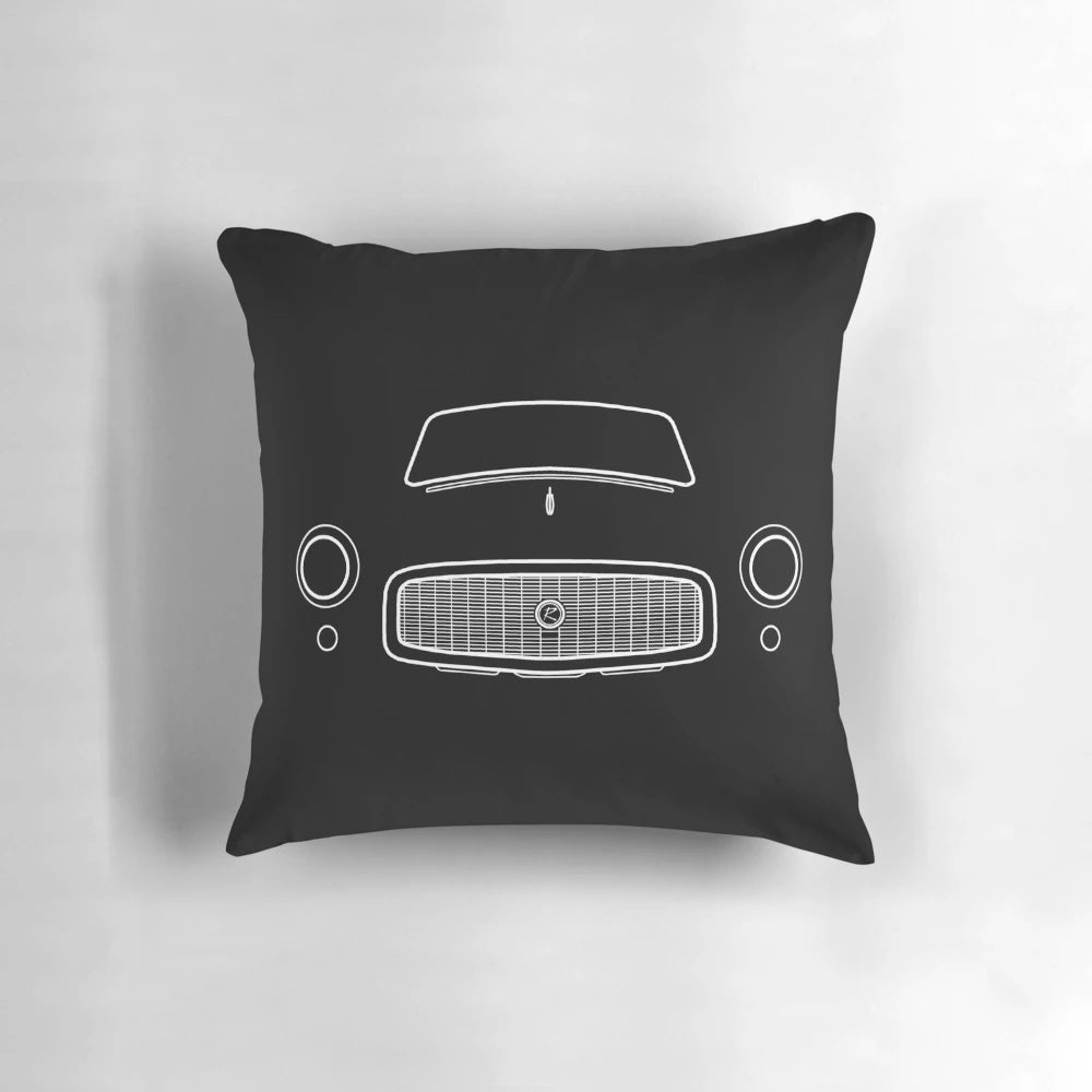 A minimalist white outline graphic of a 1960 AMC Rambler classic car printed on a soft, comfortable pillow.