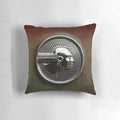 Vintage abandoned 1952 Pontiac Chieftain emblem pillow with rustic, patina-ed chrome and native american-inspired design