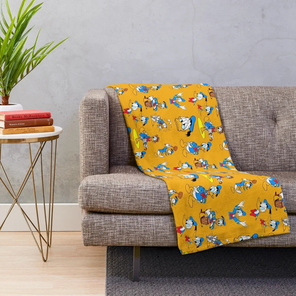 Vintage-inspired Donald Duck collage design on a high-quality plush blanket