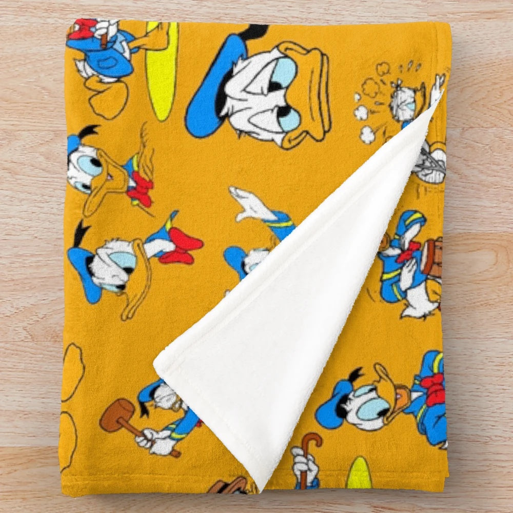Vintage-inspired Donald Duck collage design on a high-quality plush blanket
