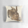Albrecht Durer Hare Pillow featuring a renaissance era woodcut illustration of a hare
