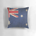 Vintage and worn Australian flag printed on a pillow, representing patriotism and pride.