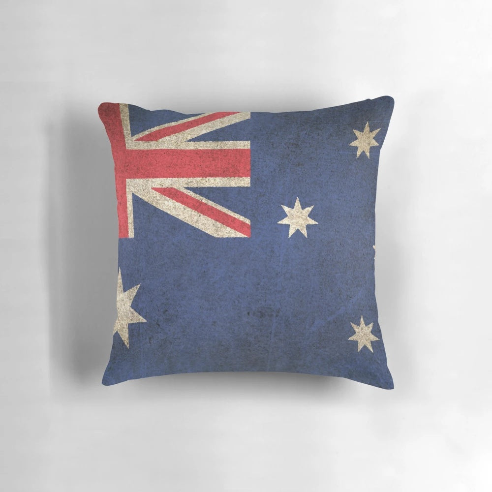 Vintage and worn Australian flag printed on a pillow, representing patriotism and pride.