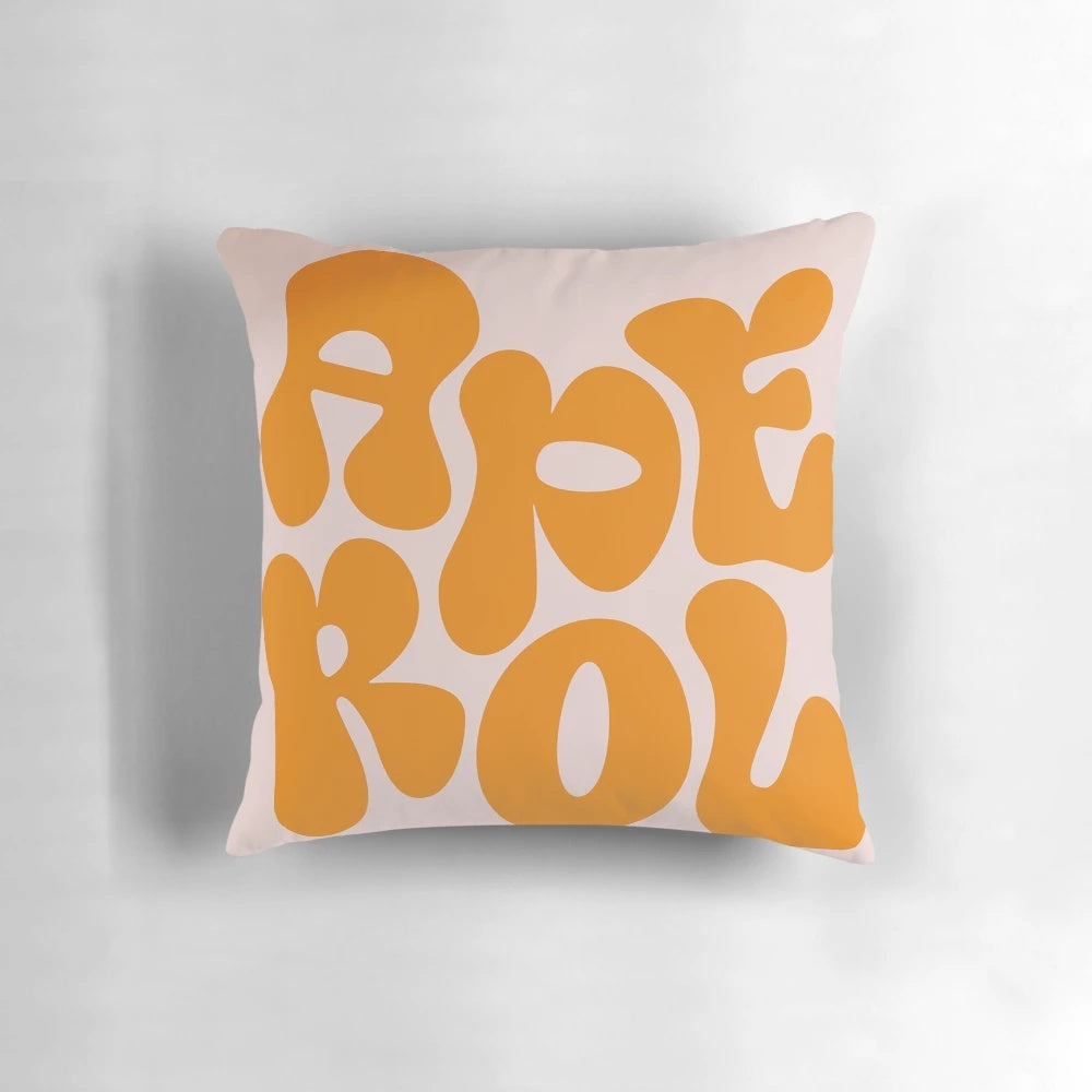Vintage-inspired Aperol Spritz cocktail pillow, featuring a retro orange and red design.