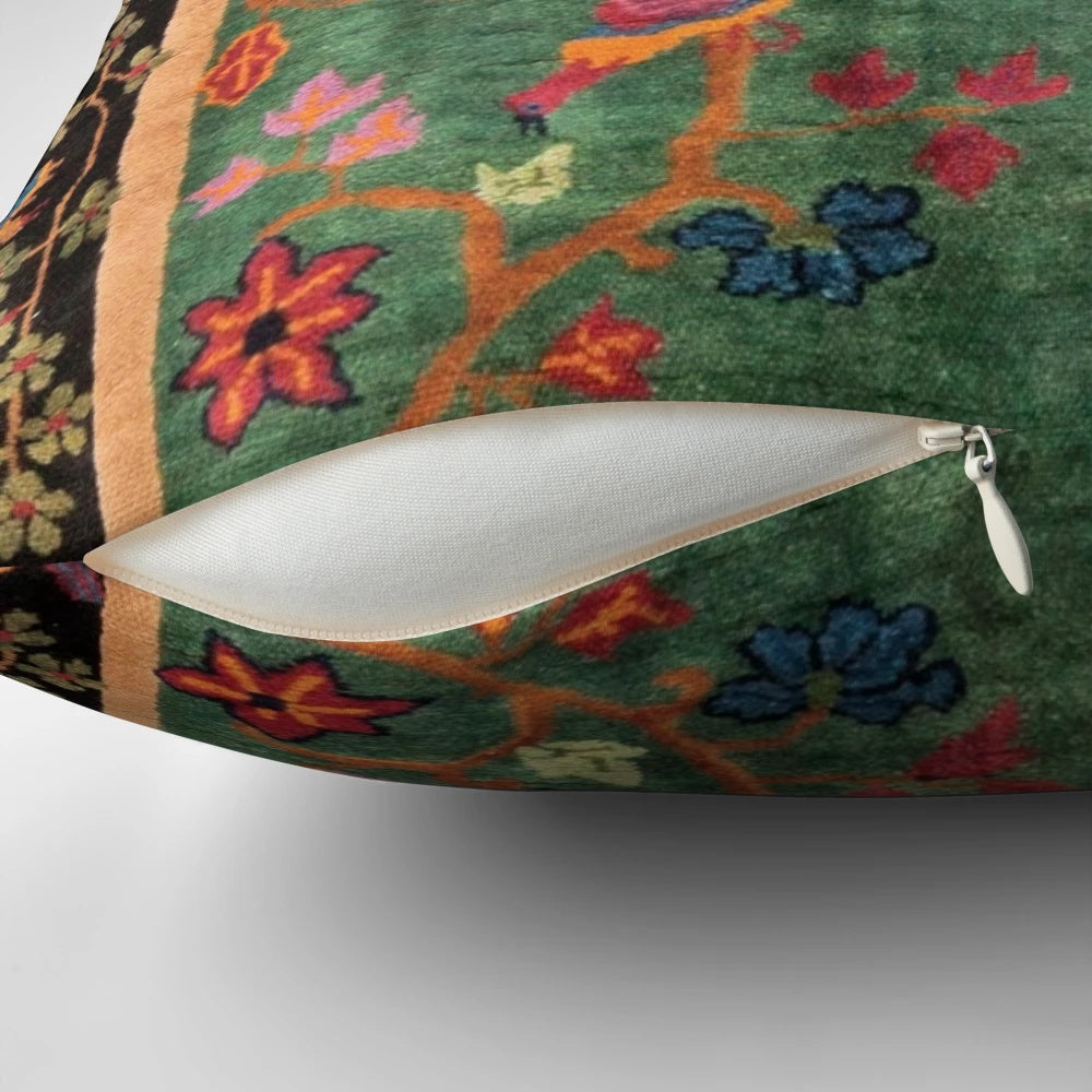 Vintage Art Deco Rug Print Pillow featuring a floral and bird design in emerald green and nature-inspired colors.