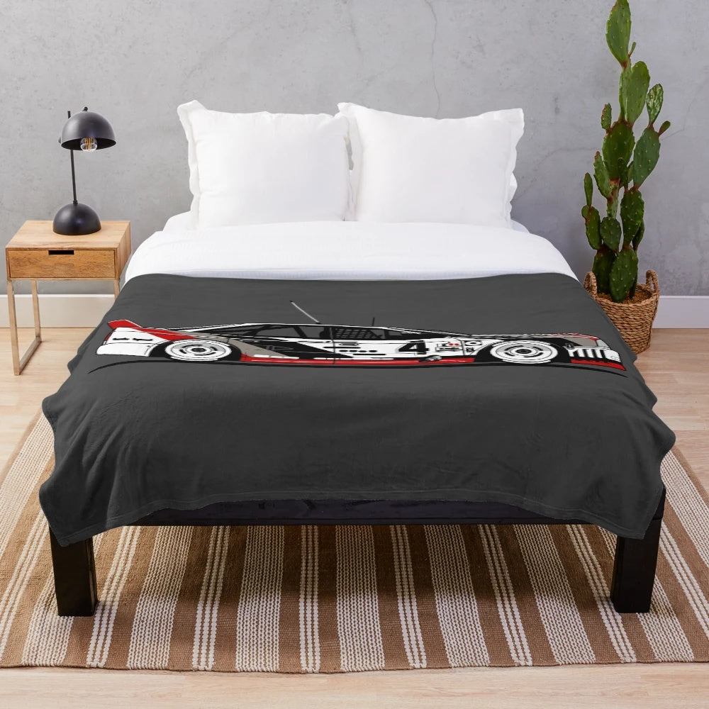 Plush blanket featuring a vintage Audi 90 GTO IMSA race car
