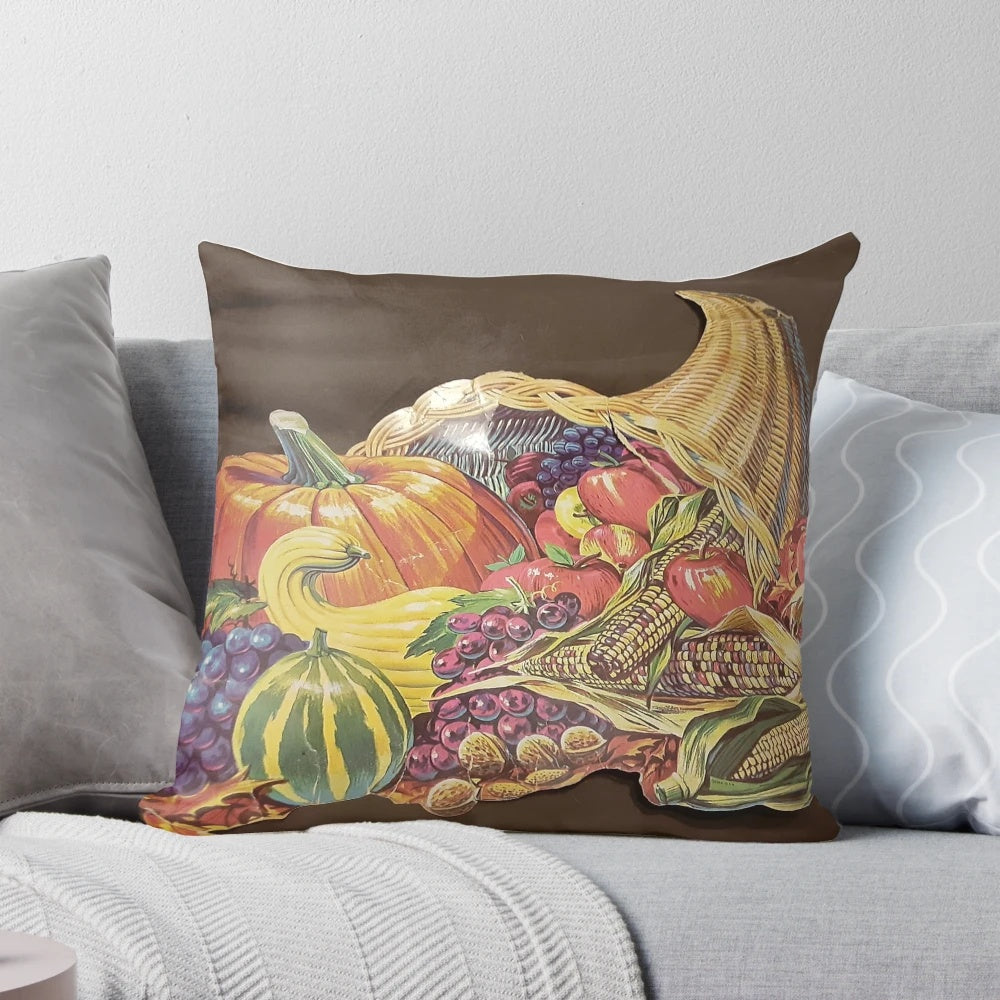 Vintage-inspired autumn cornucopia pillow with fall foliage and decorative elements