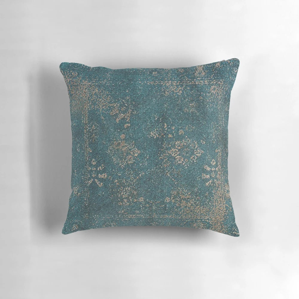 Vintage Babylonian-inspired boho pillow in turquoise, gold, and blue floral design