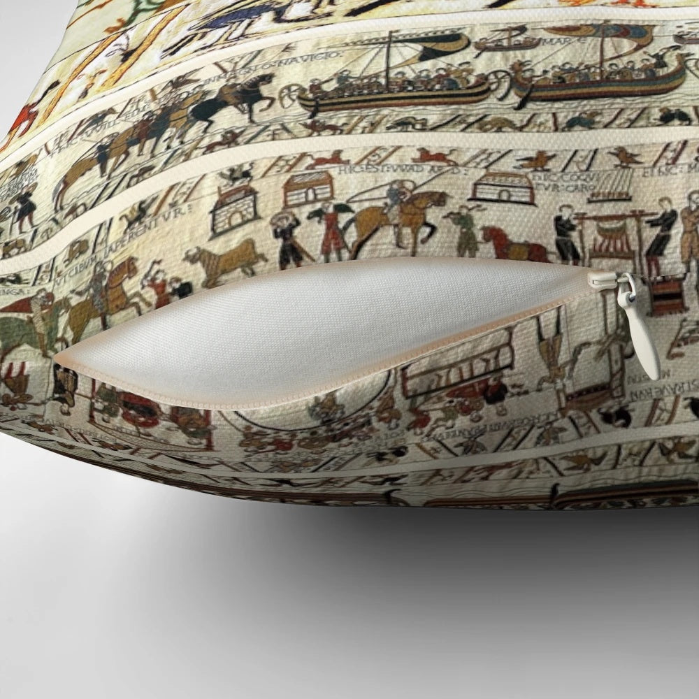 Detailed embroidered pillow depicting the famous Battle of Hastings with Norman knights on horseback.
