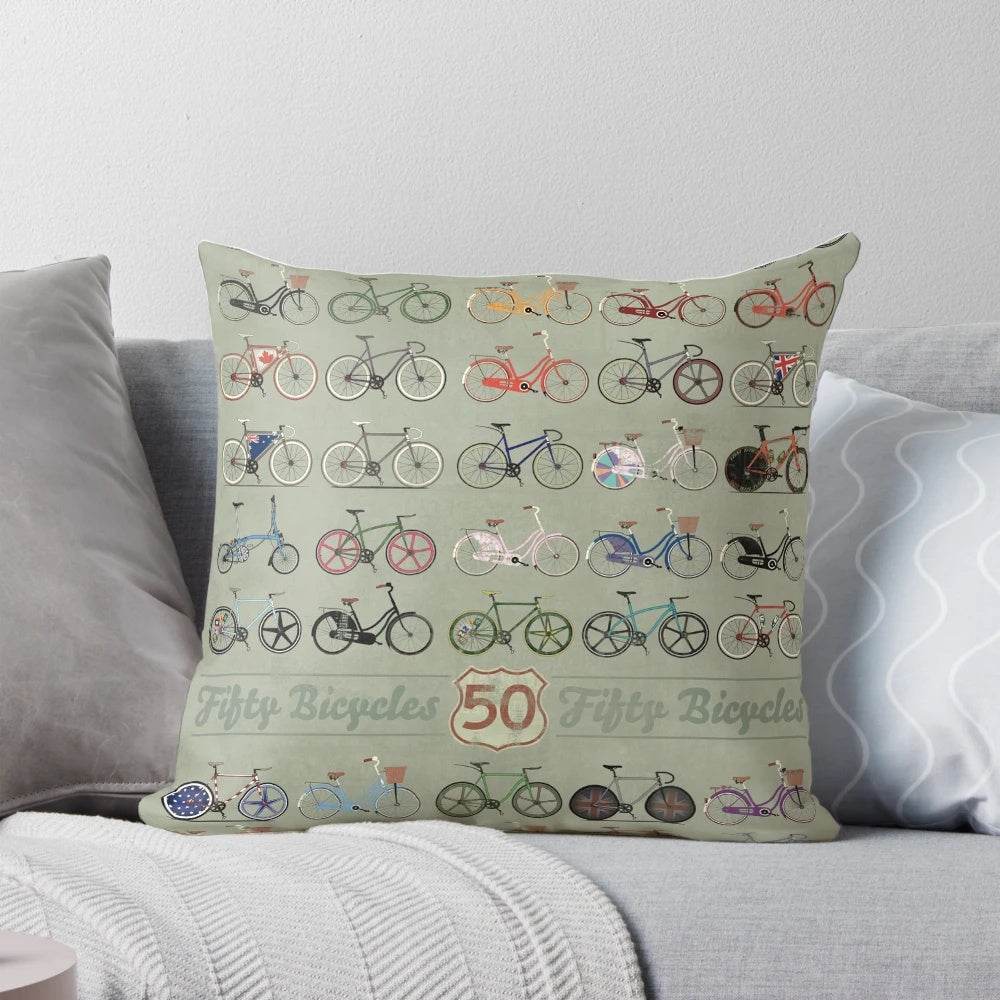 Decorative throw pillow featuring a collage of 50 vintage, retro, and fixed gear bicycles