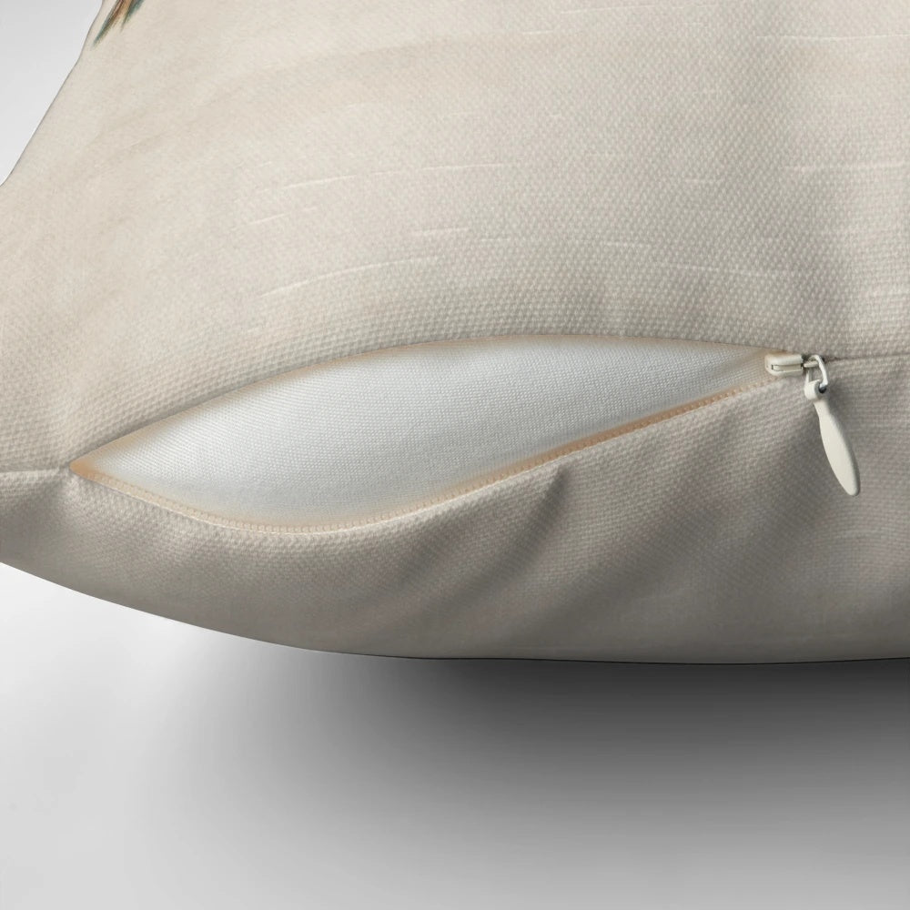 A vintage-inspired throw pillow featuring a beautiful bird design, perfect for adding a touch of rustic charm to any space.