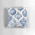 A blue and white vintage-style Toile de Jouy patterned Christmas ornament pillow