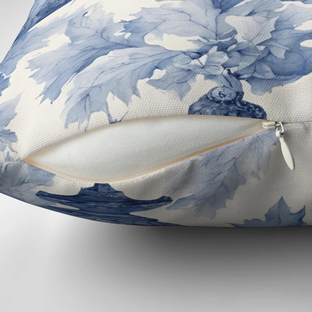 A blue and white vintage-style Toile de Jouy patterned Christmas ornament pillow