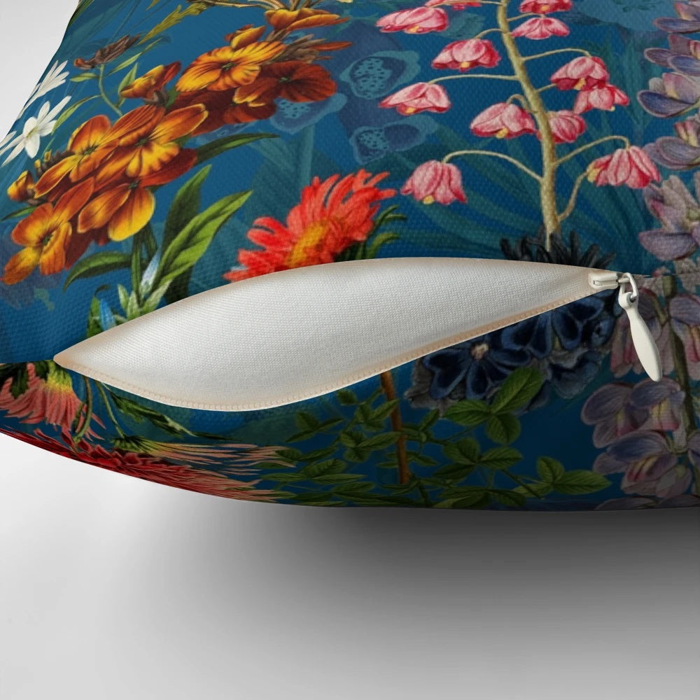 Vintage blue floral botanical garden pattern printed on a soft, plush pillow