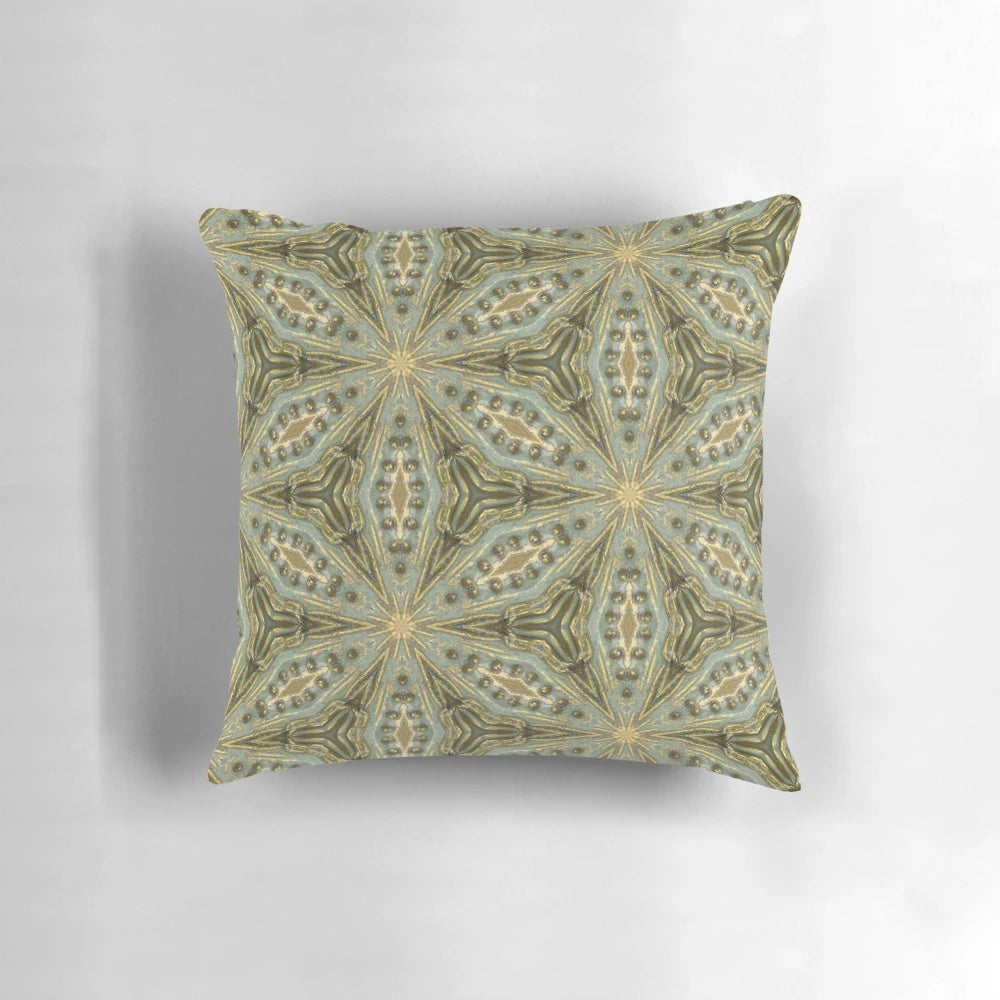 Vintage-inspired pillow with a bold kaleidoscope print, antique gold beads, and a sage green wash for a unique, one-of-a-kind look.