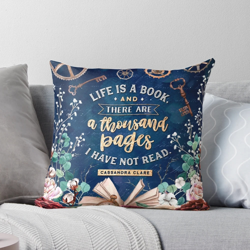 Vintage-inspired decorative pillow featuring a "Life is a Book" design with floral, gears, and literary elements.