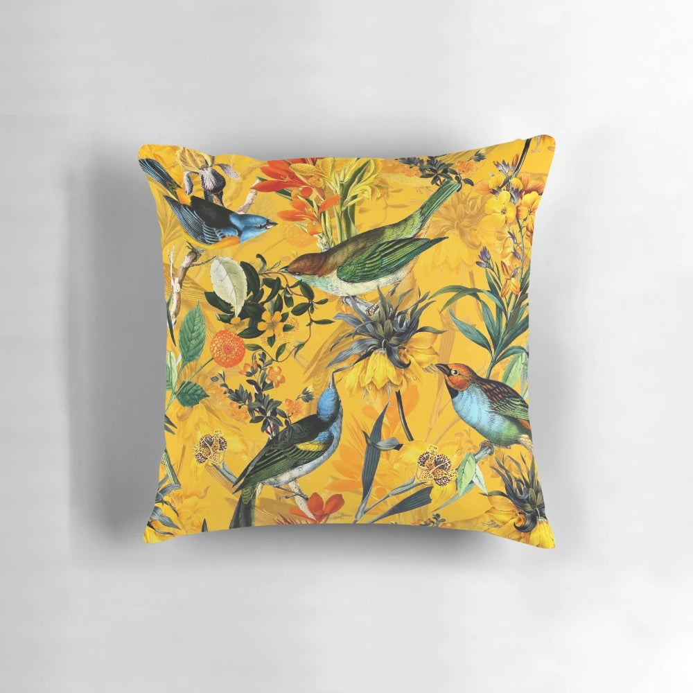 Vintage-style botanical pillow with vibrant flowers and hummingbirds