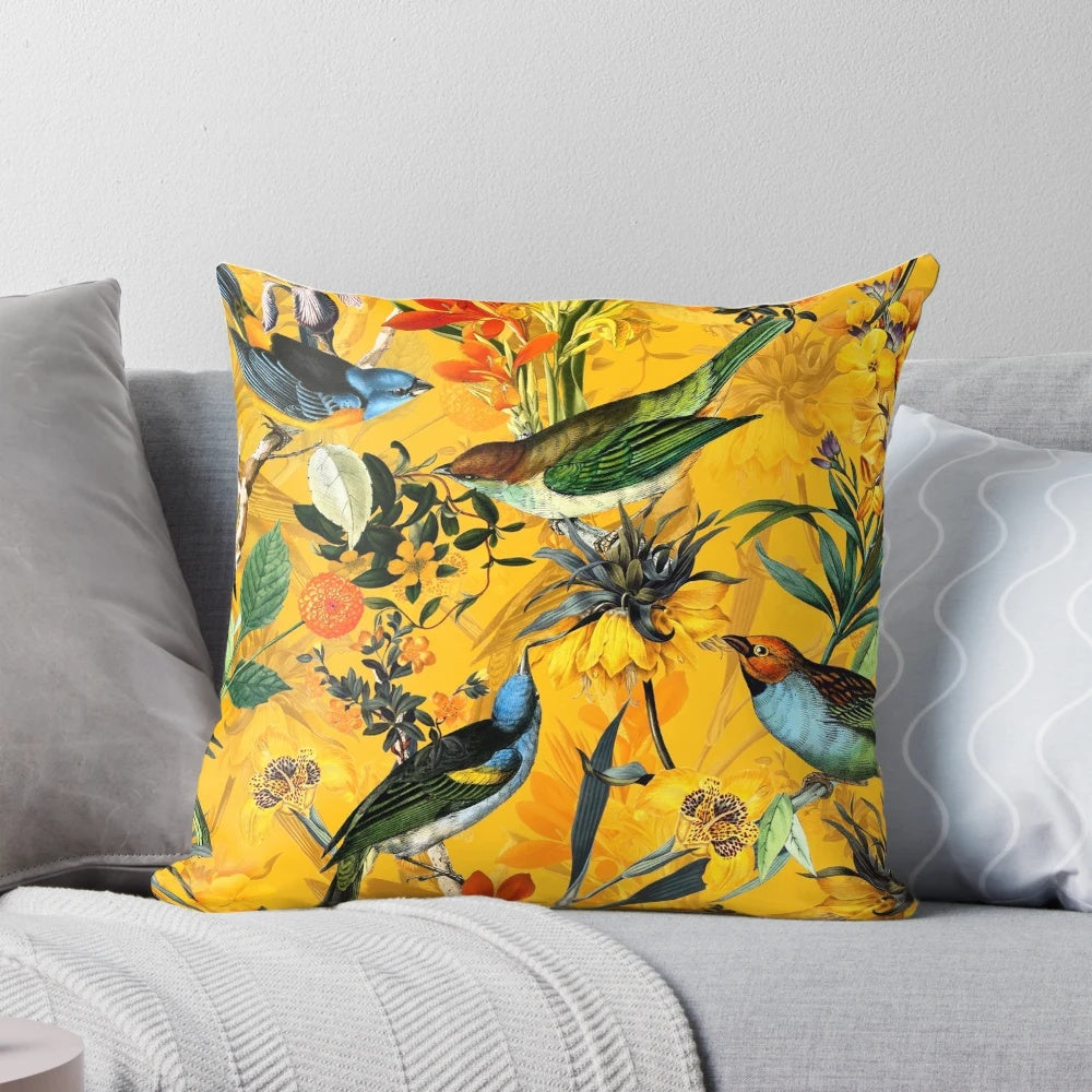 Vintage-style botanical pillow with vibrant flowers and hummingbirds