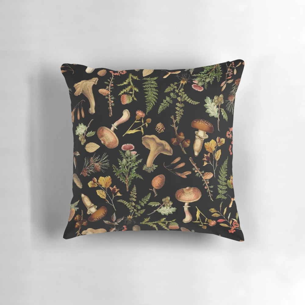 Vintage-inspired throw pillow featuring a botanical mushroom design in a dark, moody color palette