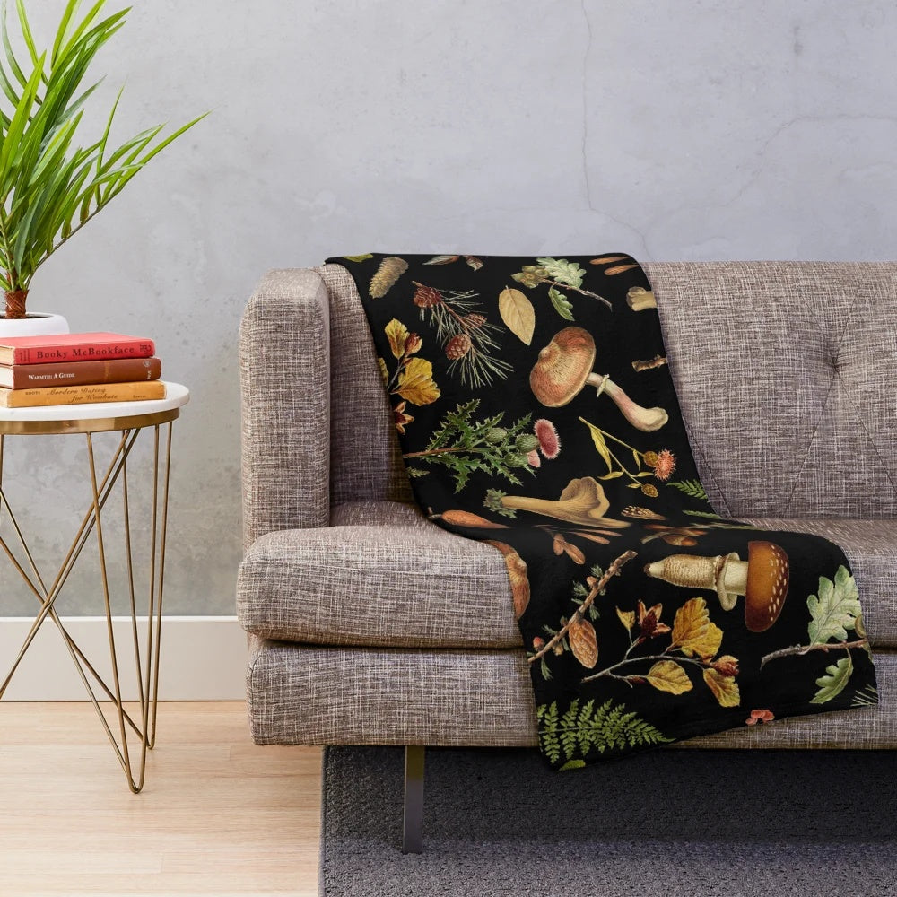 Vintage-style plush blanket with botanical mushroom and floral pattern