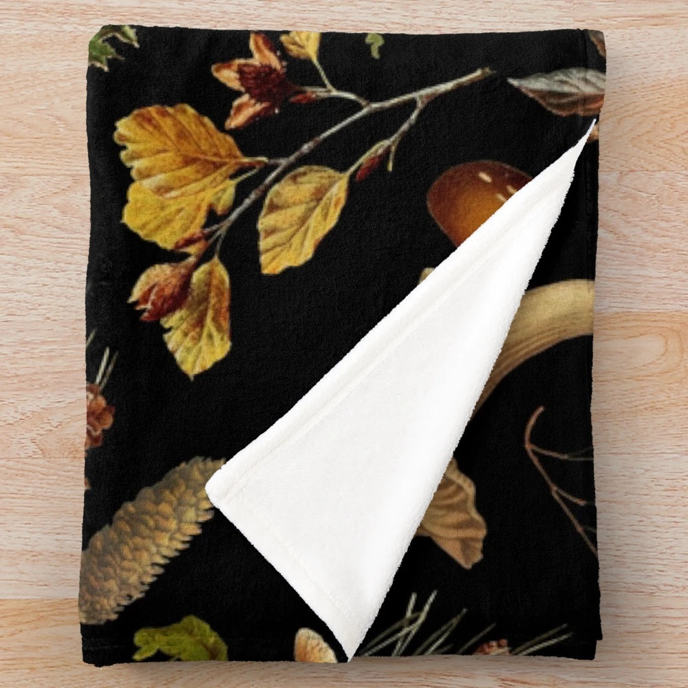 Vintage-style plush blanket with botanical mushroom and floral pattern