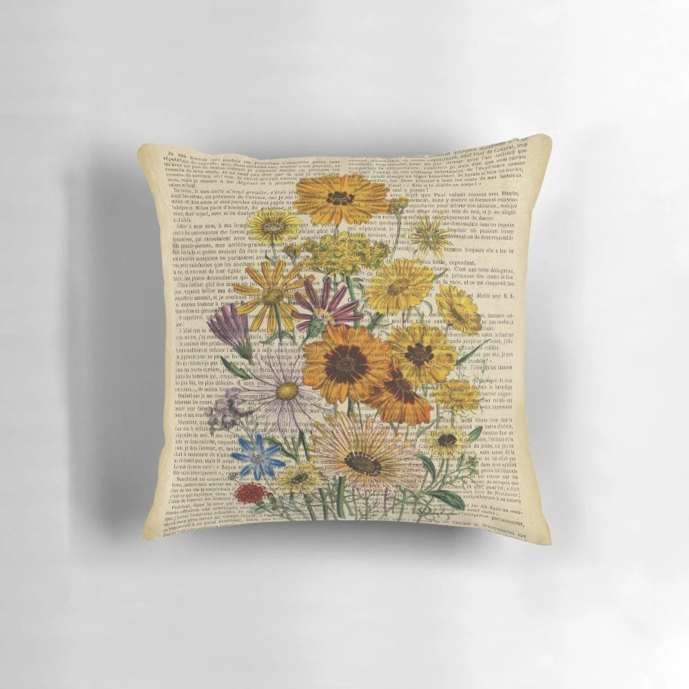 Botanical print of garden flowers on an old, aged book page decorative throw pillow