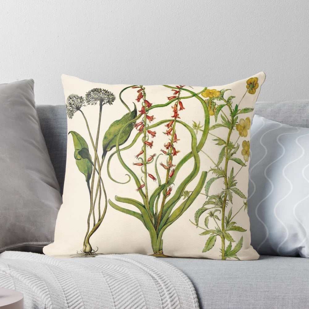 A vintage-inspired botanical study pillow featuring a painterly illustration of flowers including allium, hyacinth, and viola.