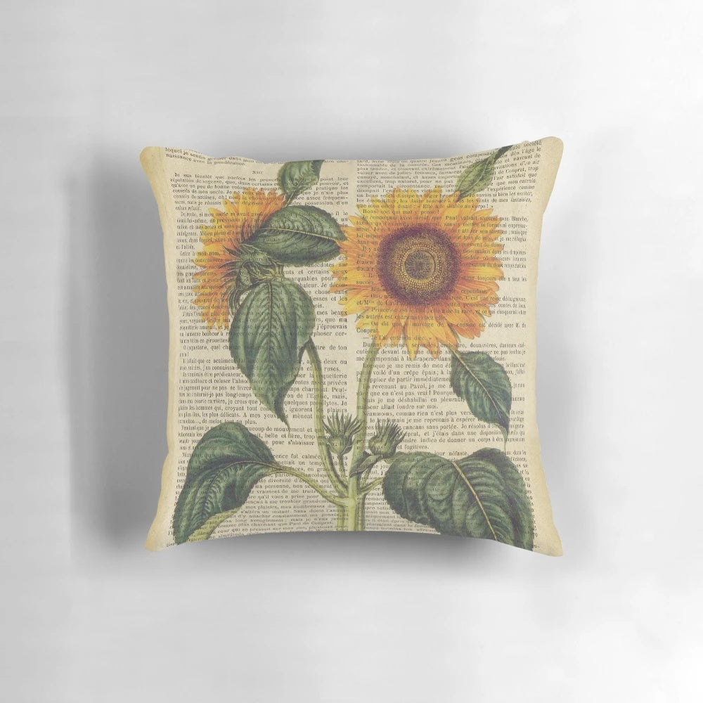 Vintage botanical sunflower print on aged book page pillow