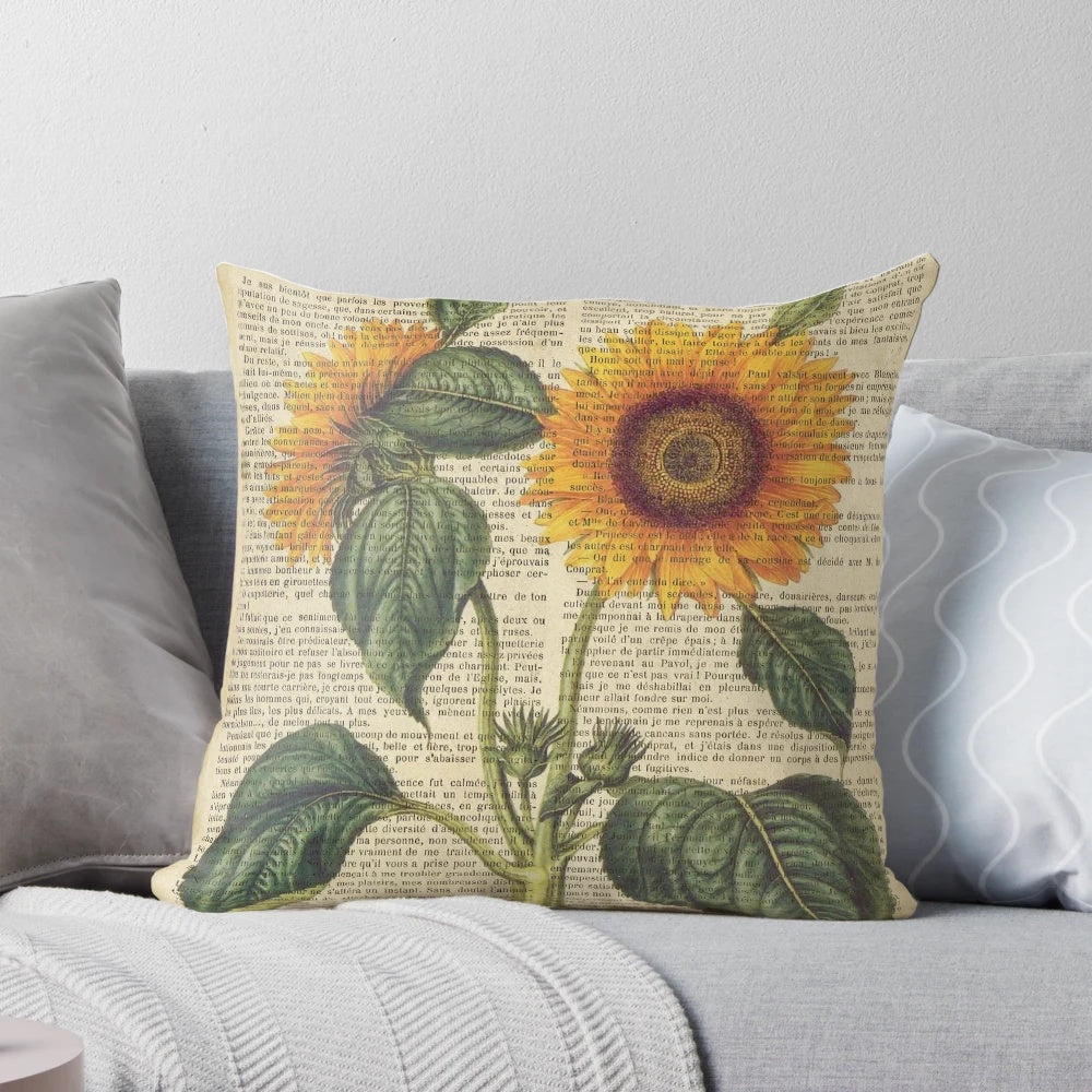 Vintage botanical sunflower print on aged book page pillow