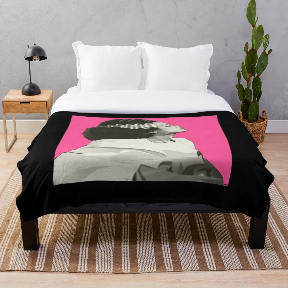 Vintage-style Bride of Frankenstein plush blanket with black and white horror movie graphics
