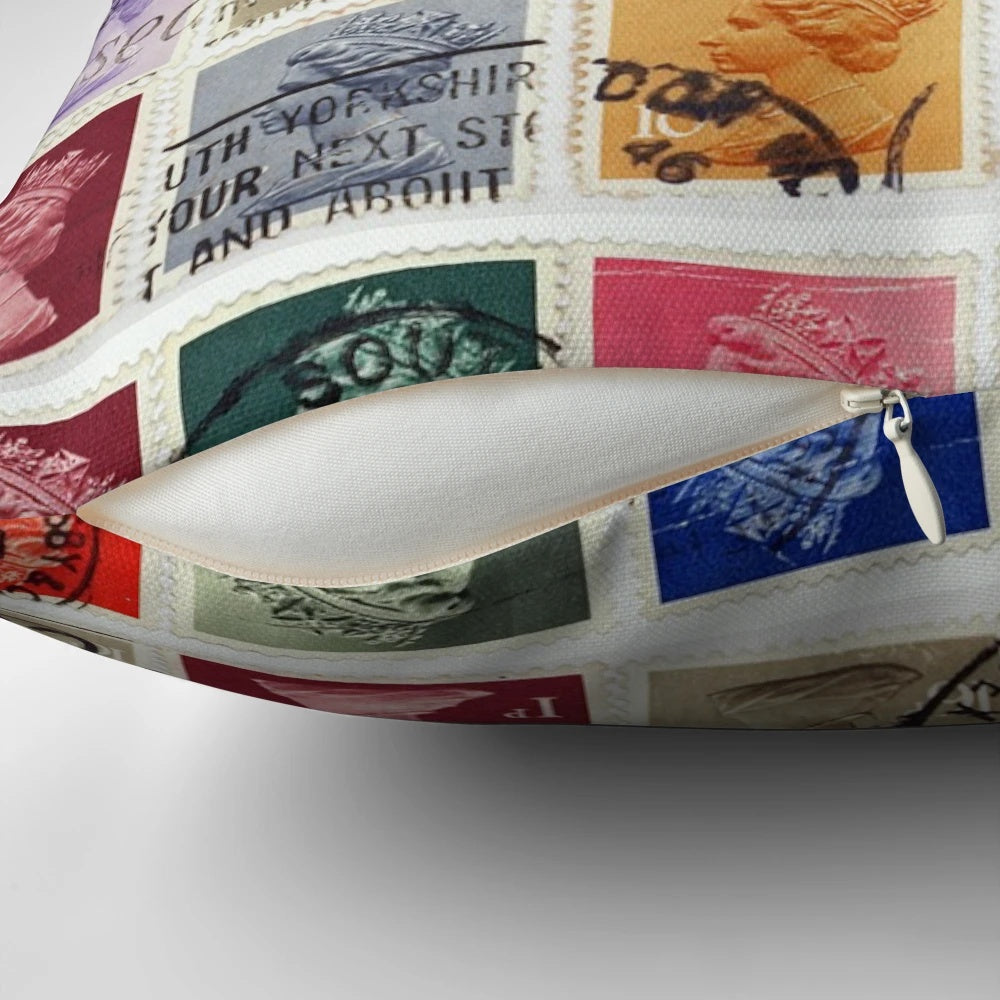 Pillow featuring a vintage British postage stamp design with the profile of Queen Elizabeth