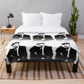 Buster Keaton inspired plush blanket with black and white silhouette design