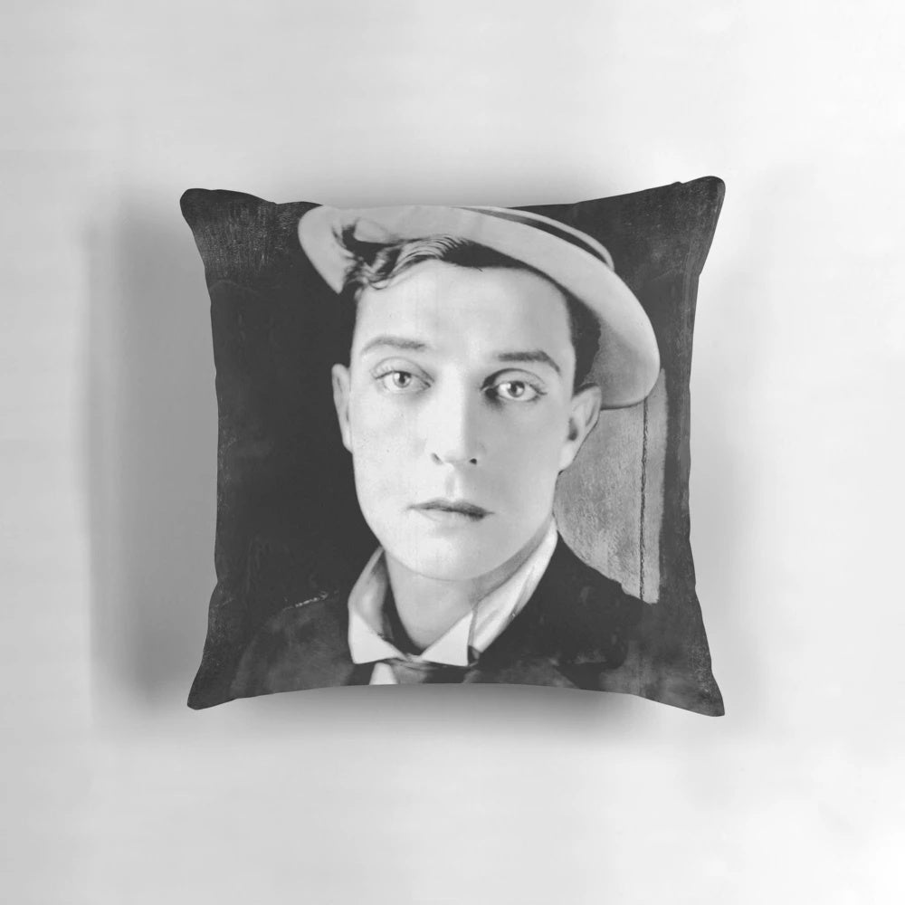 A black and white vintage photograph of the classic actor Buster Keaton printed on a decorative pillow.