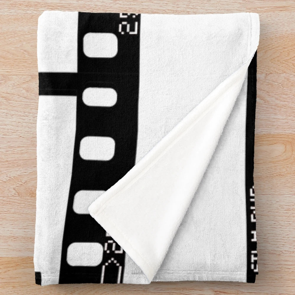 Vintage camera and film strip plush blanket for movie lovers