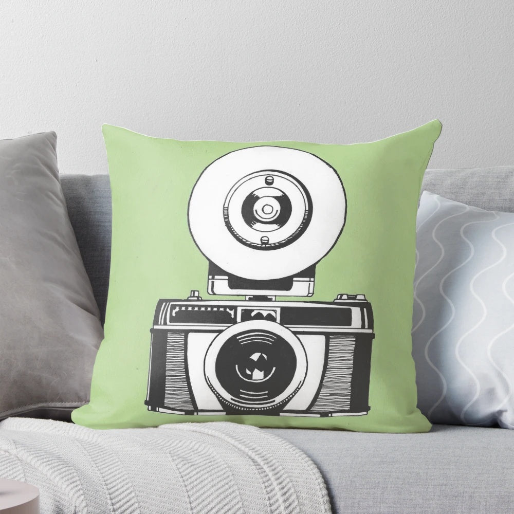 Vintage camera-shaped pillow for photography lovers and vintage decor enthusiasts