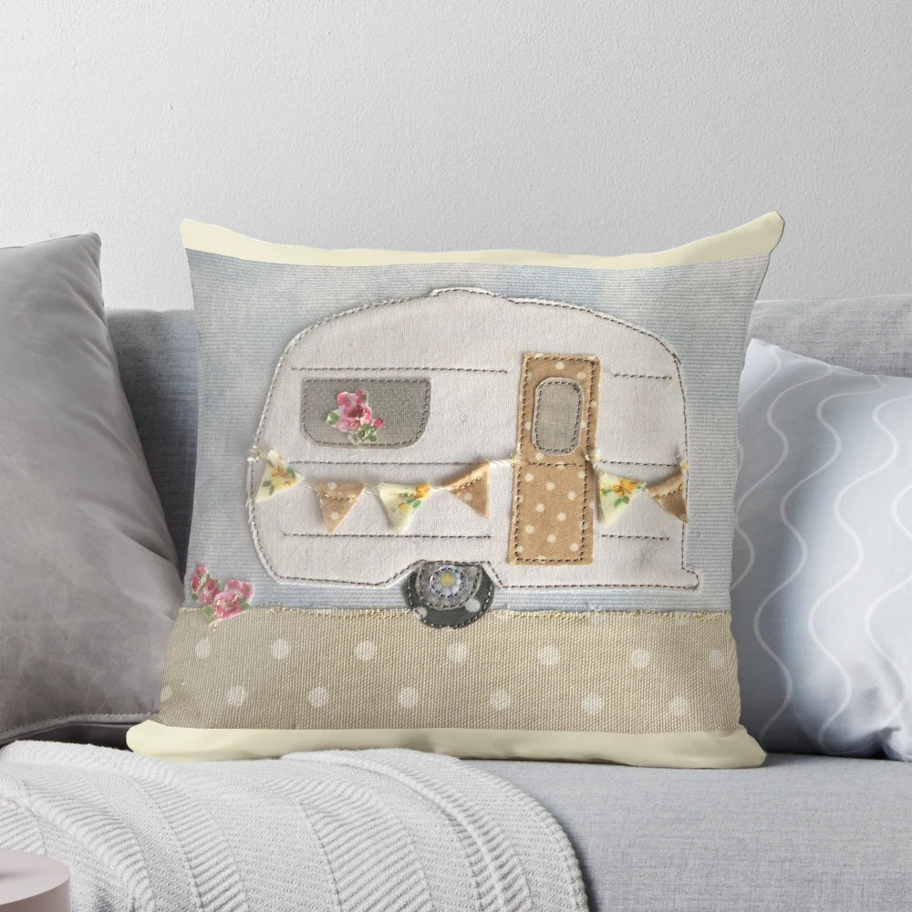 Vintage-inspired caravan-themed decorative pillow with machine embroidered floral stitching