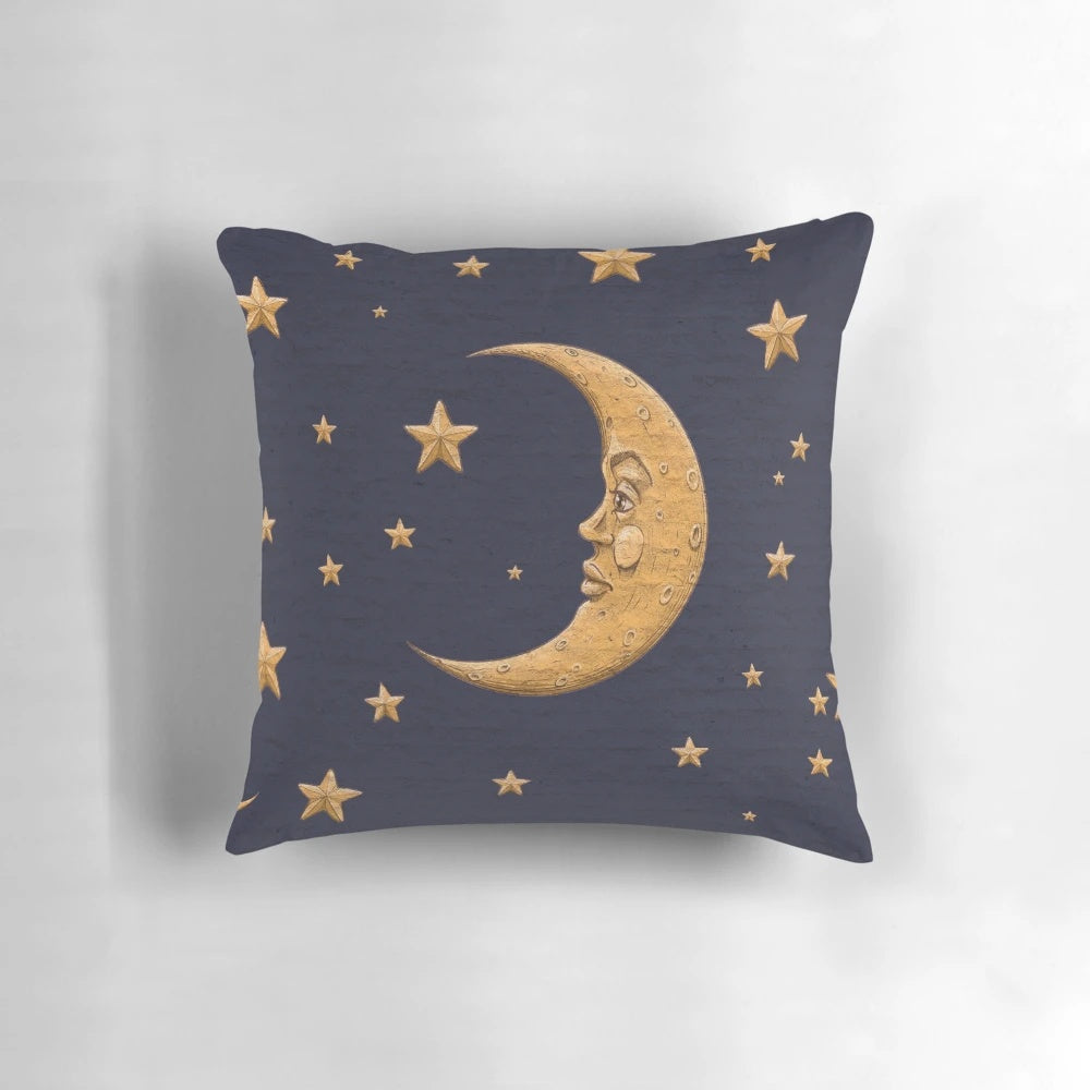 Vintage-style blue throw pillow with golden moon and stars design