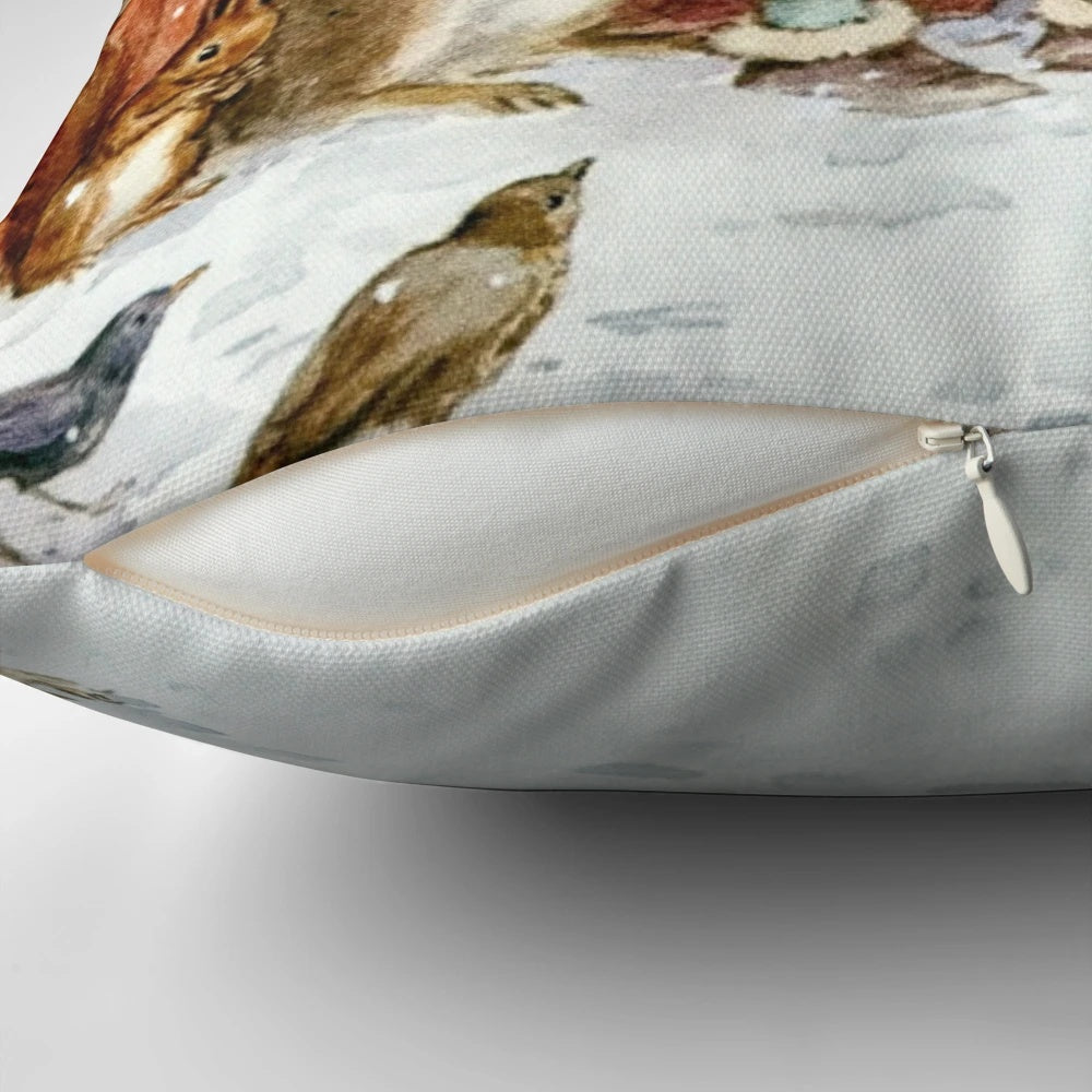 Vintage-style pillow featuring a cozy winter scene with woodland animals in a snowy forest, illustrated by renowned artist Margaret Tarrant.