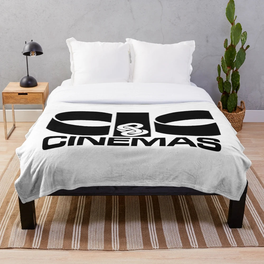 Vintage CIC Cinemas-inspired plush blanket with classic movie logos