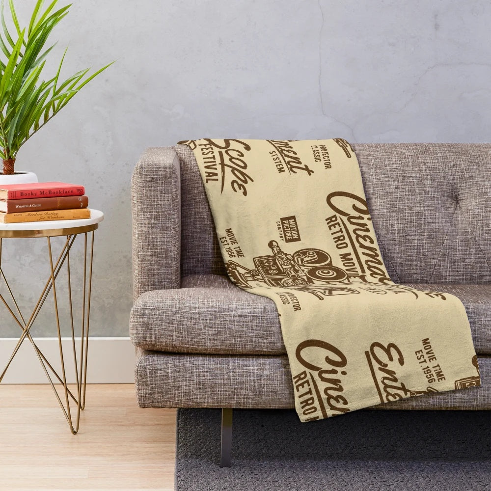Vintage cinema-themed plush blanket featuring classic movie design