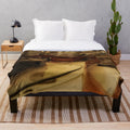 Vintage cinema-themed plush blanket featuring old movie projector and Moroccan cultural elements