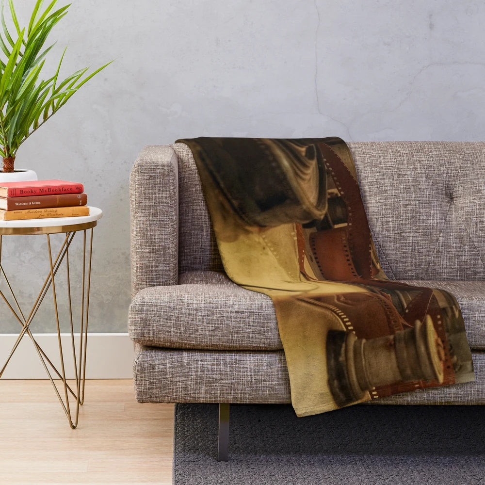 Vintage cinema-themed plush blanket featuring old movie projector and Moroccan cultural elements