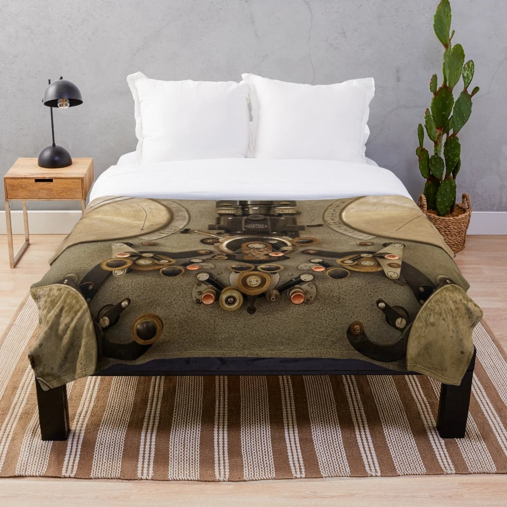 Vintage cinema-themed plush blanket with old camera and film reel design