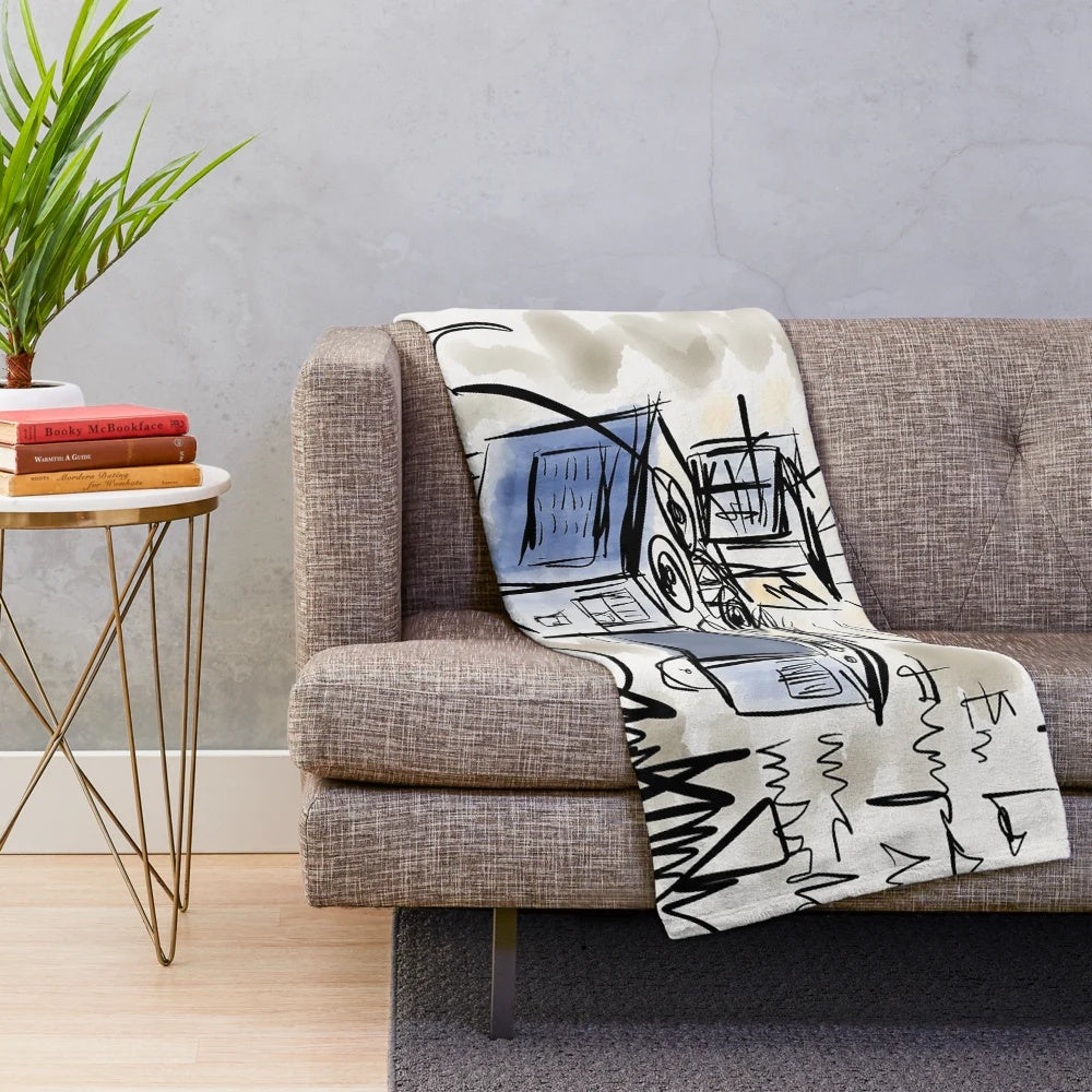 Plush blanket featuring a vintage cinema montage design