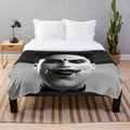 Cozy plush blanket featuring a classic cinema inspired design