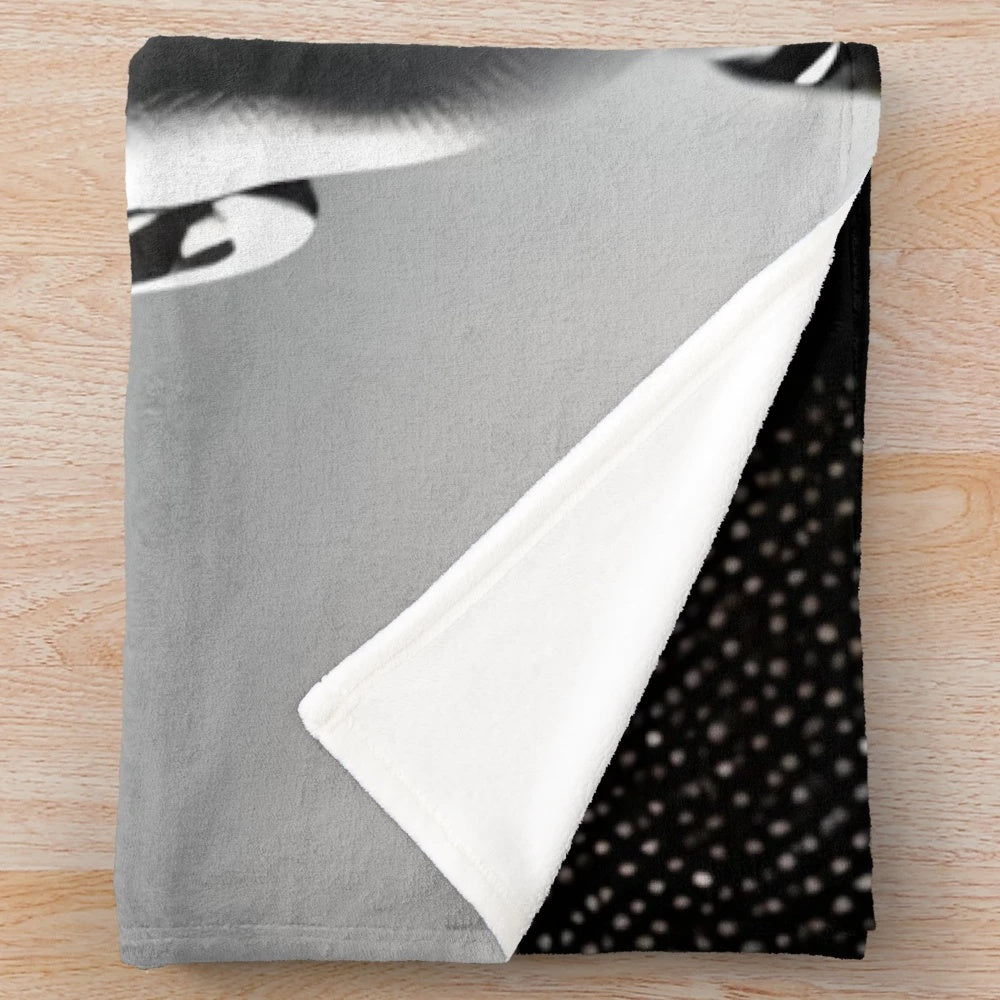Cozy plush blanket featuring a classic cinema inspired design