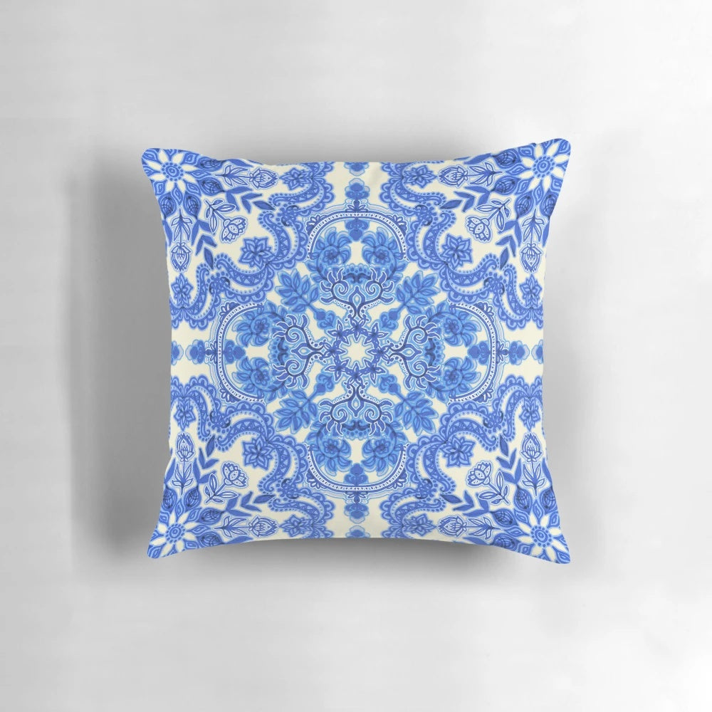 Vintage-inspired cobalt blue and China white folk art pattern pillow