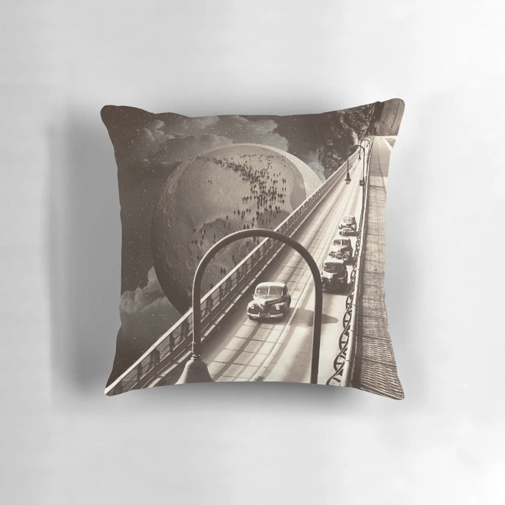 A surreal, dreamlike collage design featuring vintage elements and cosmic imagery on a throw pillow.