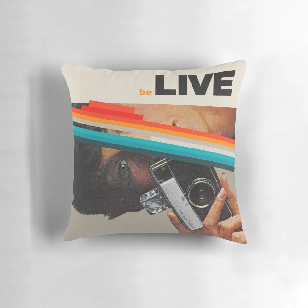 Vintage collage print of a woman with a camera on a decorative throw pillow
